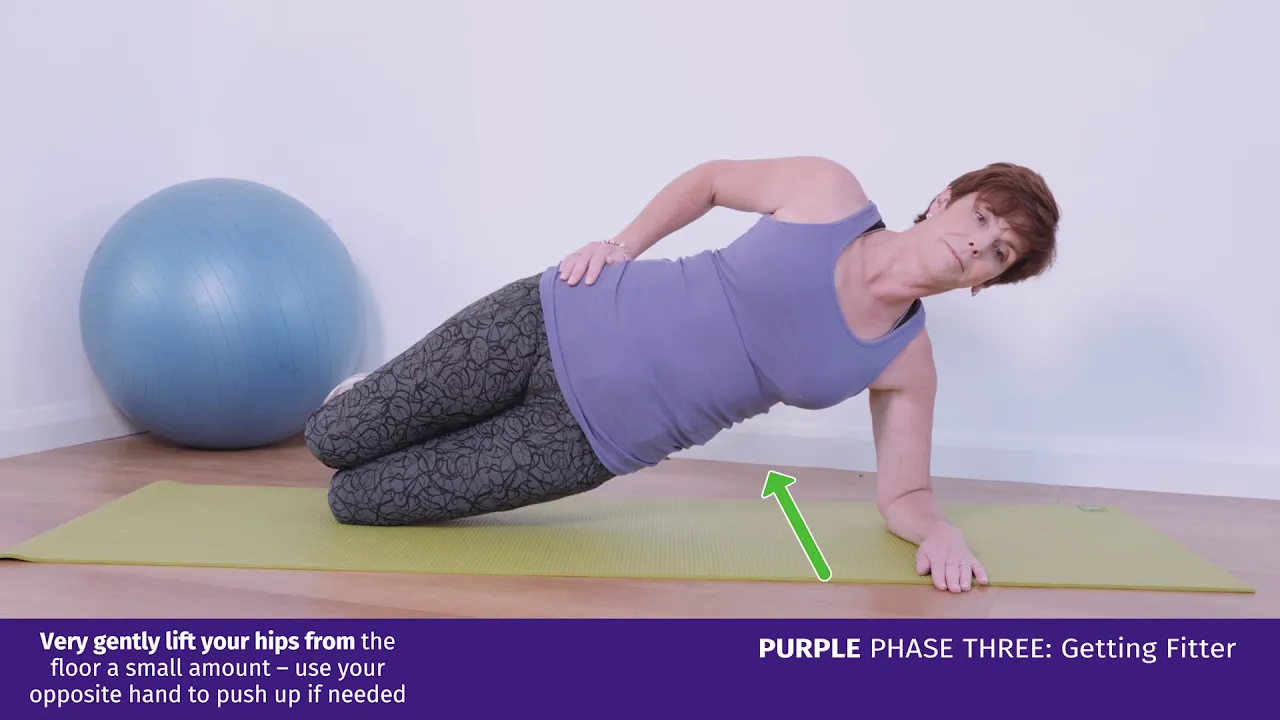 a woman doing a yoga pose