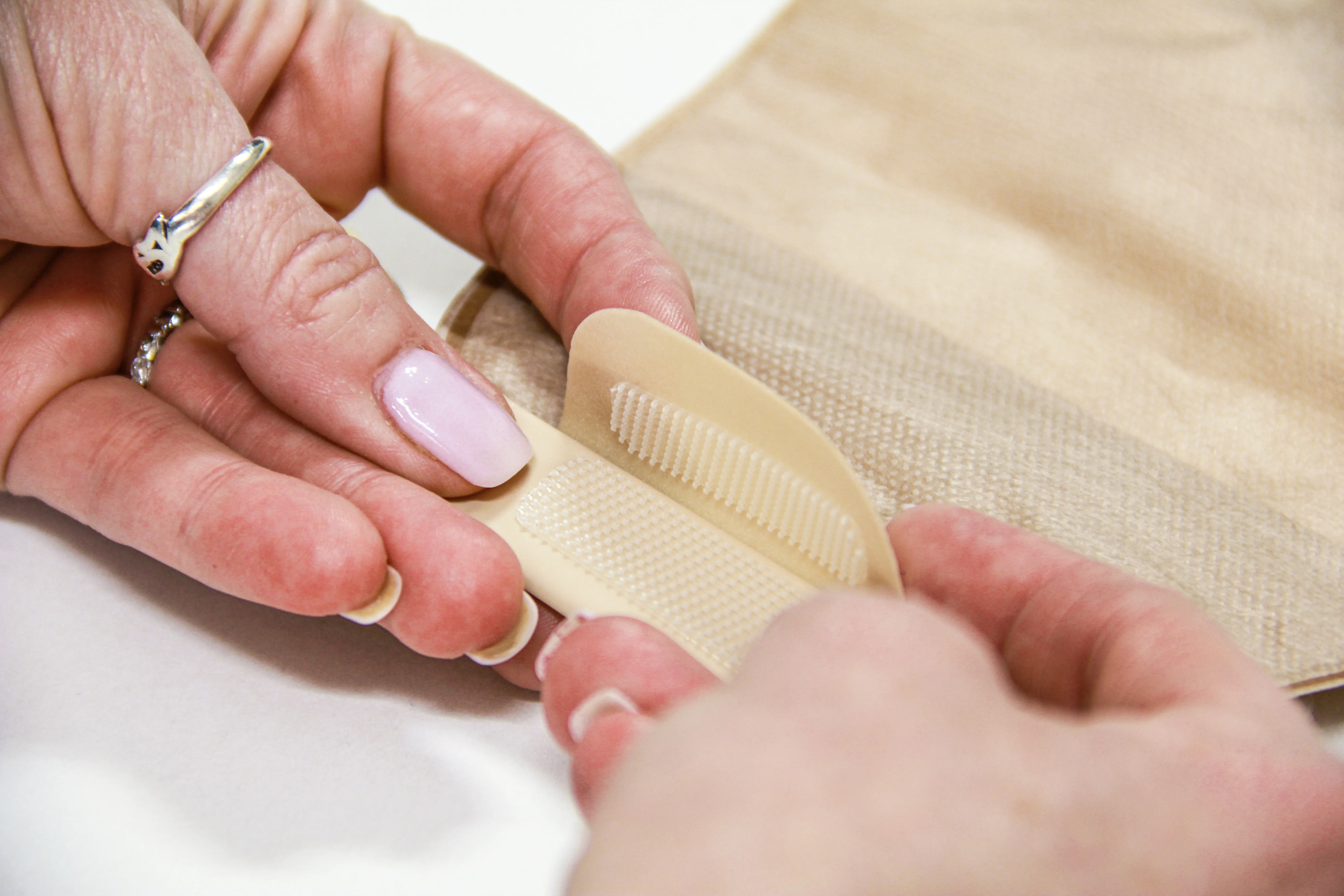 a person holding a white object